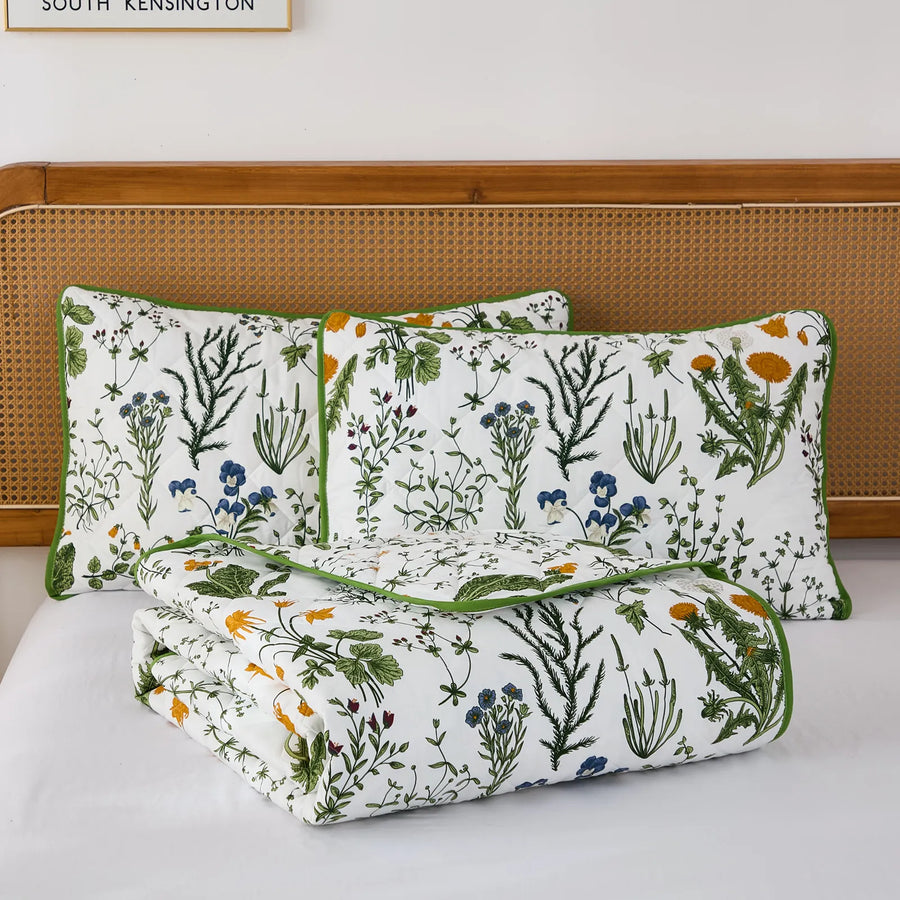 stacked vintage herbarium botanical quilt and matching shams
