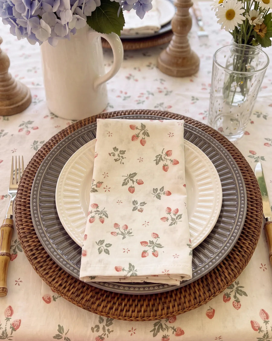 strawberry bramble napkin folded on plate top view