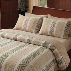 Top angle view of tan patterned bedding