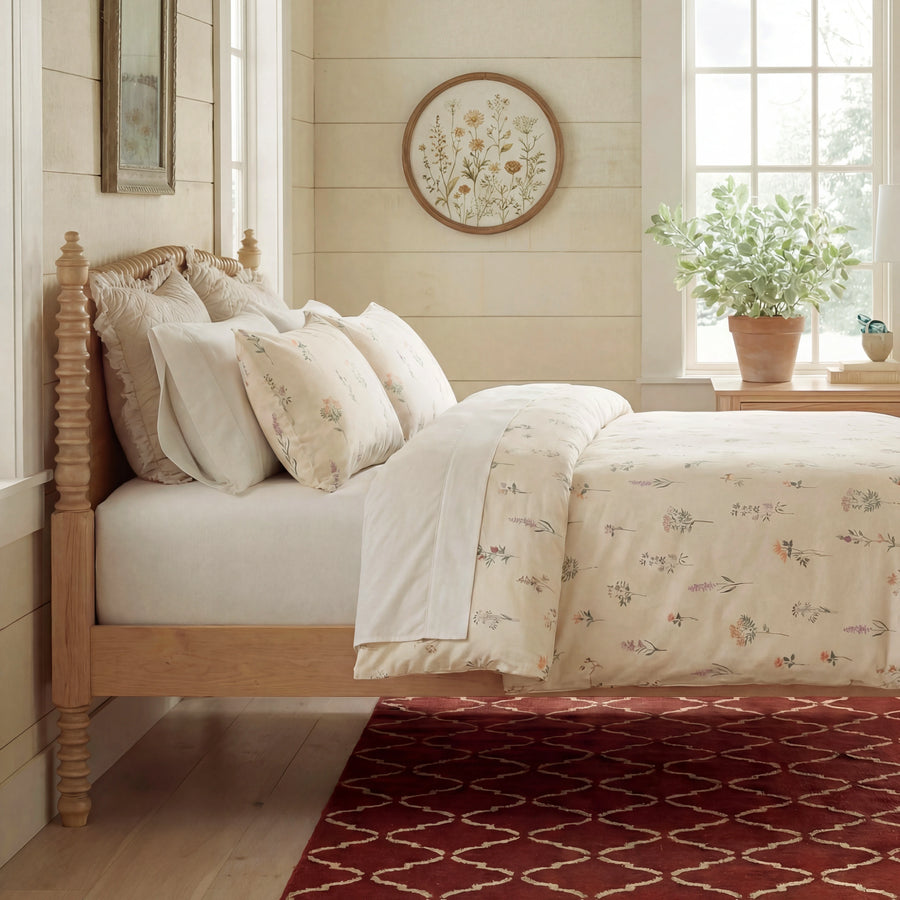 wildflower meadow duvet cover set in bright farmhouse bedroom with botanical wall art