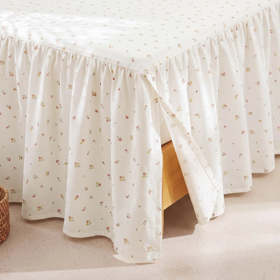 tiny blossom bed skirt cream floral split corner close up