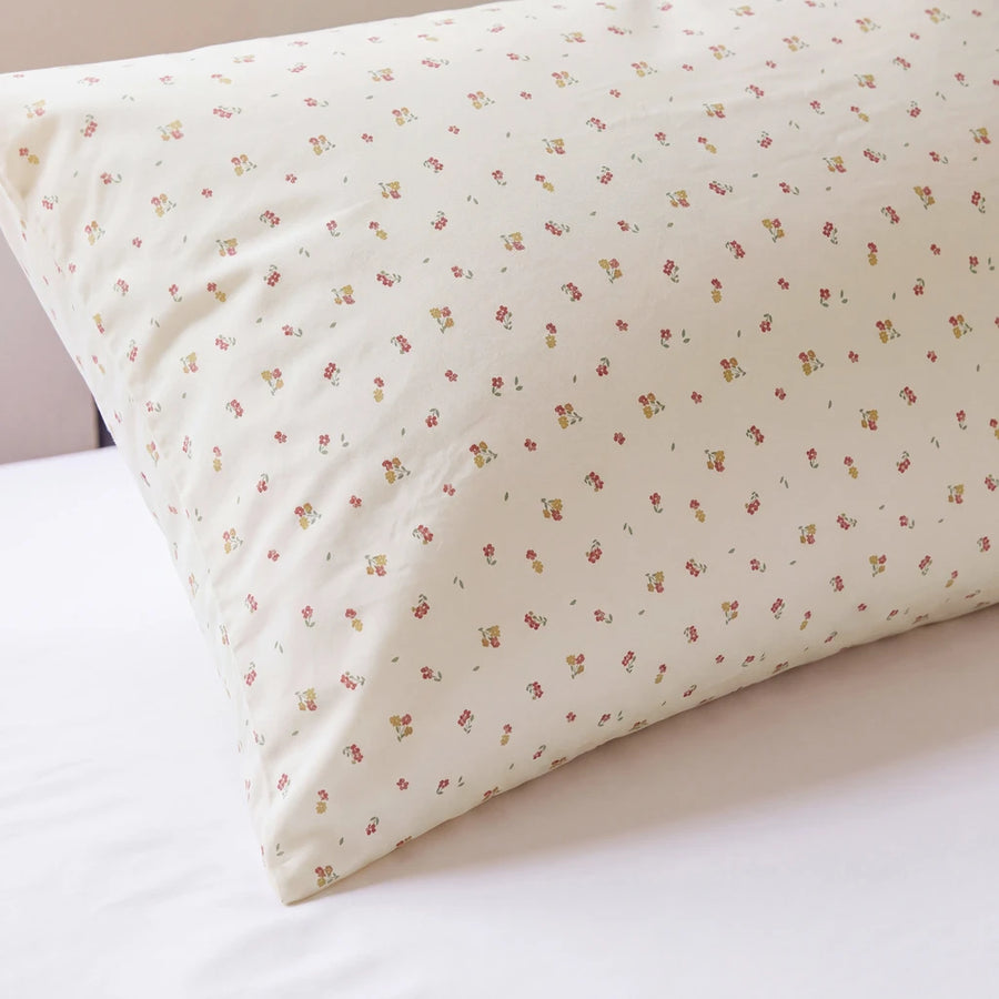 tiny blossom pillowcases cream yellow pink floral print close up