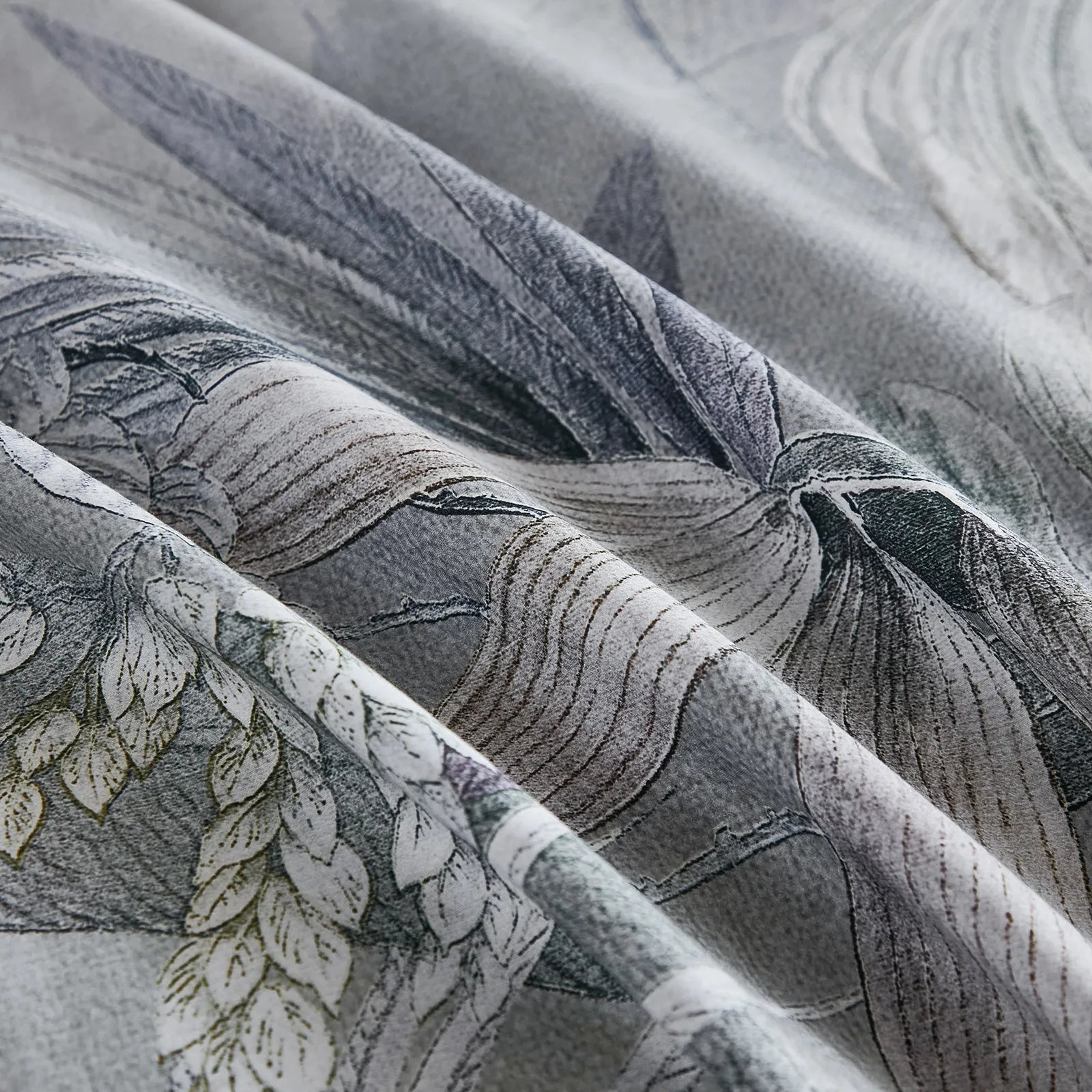 Close up detail of Tropical Mist botanical fabric