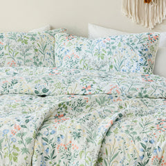 Detailed view of the 100% cotton fabric and subtle texture of the quilt.