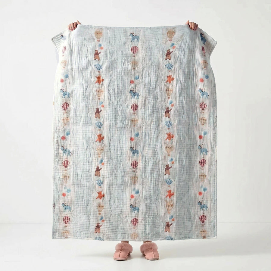 vintage storybook cotton blanket whimsical sky bed setup