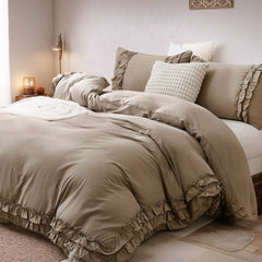 A detailed close-up showing the soft warm greige fabric and ruffled texture