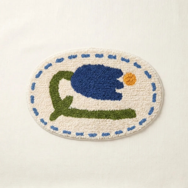 whimsy garden rug blue tulip flat lay product photo