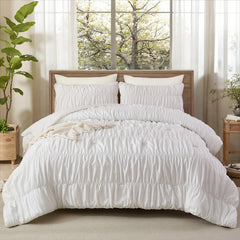 White ruffle cotton comforter front view with pillows
