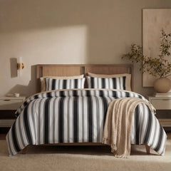 Full front view of white black grey striped bedding set