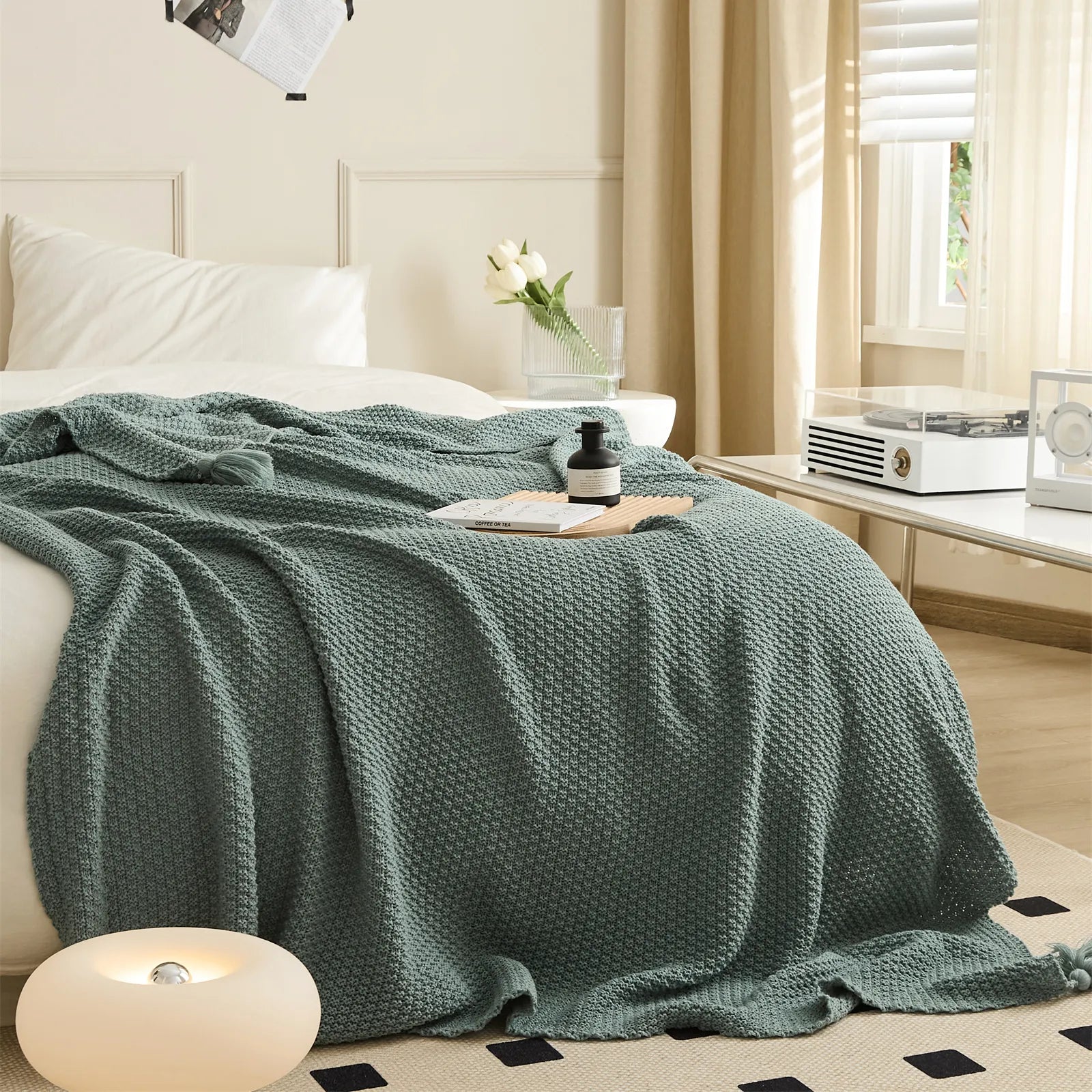 Aqua Knitted Throw Blanket Draped on Bed with Modern Lamp