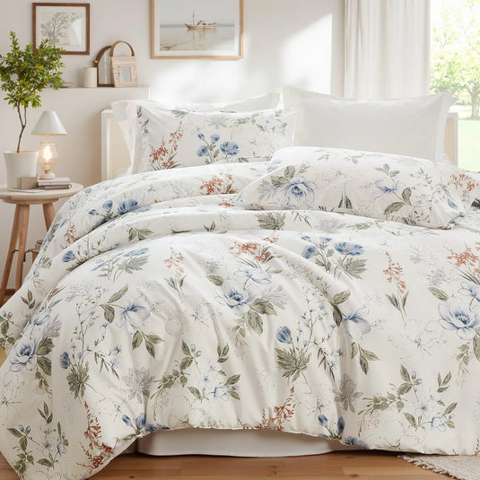 A pair of 100% cotton blue floral duvet cover set styled on bed