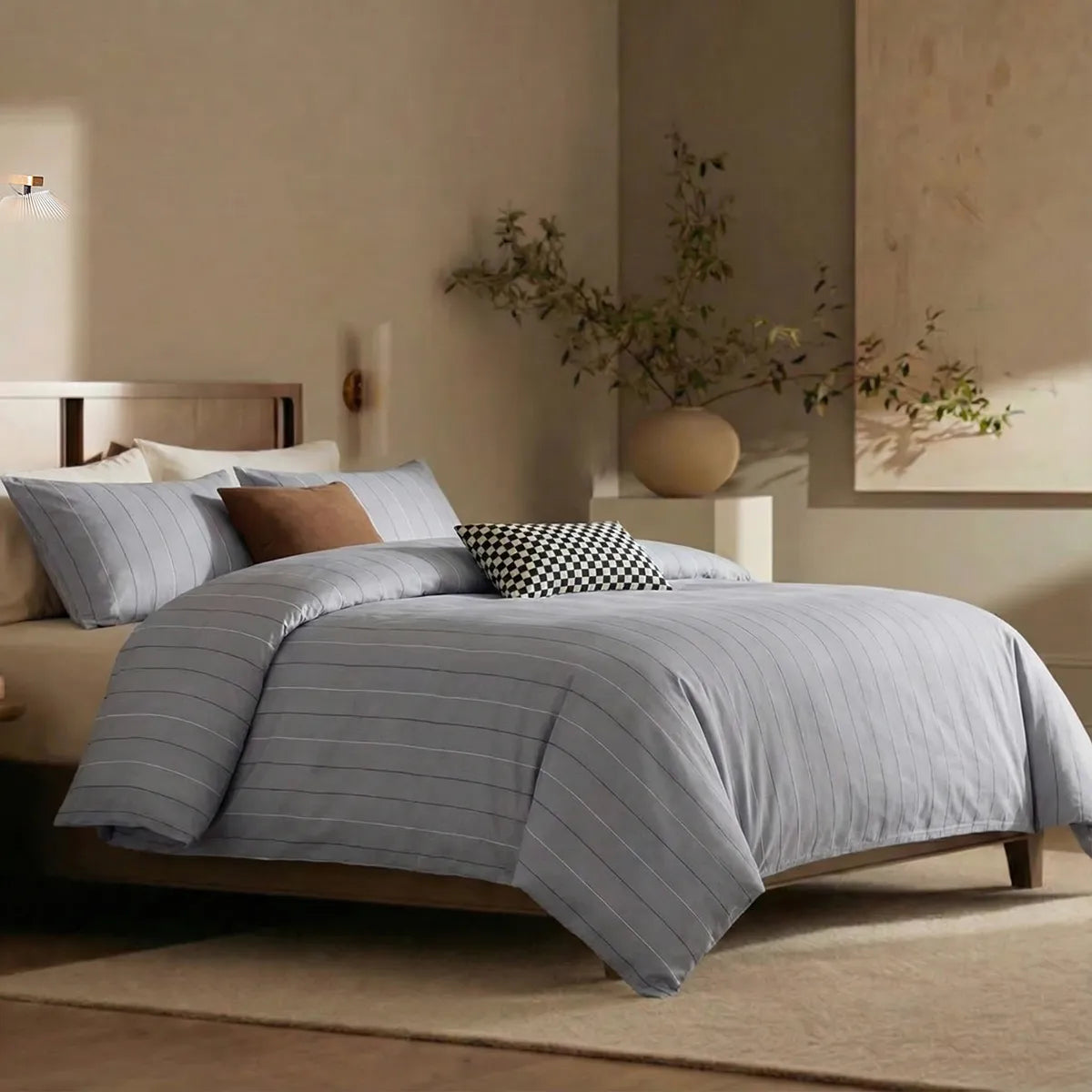 Angled shot of blue striped duvet cover on bed