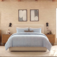 Full front view of blue white grey striped bedding set