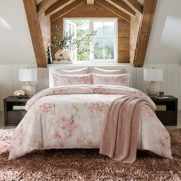 pink lily floral cotton duvet cover set displayed in romantic cottagecore bedroom decor