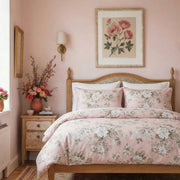 frontal bedroom display of the blush peony duvet set with feminine pink walls and decor