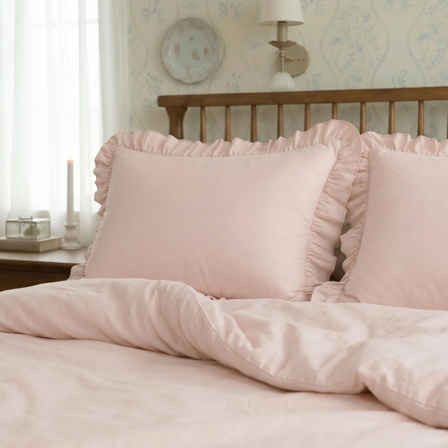 blush pink ruffled pillowcase close up vibe