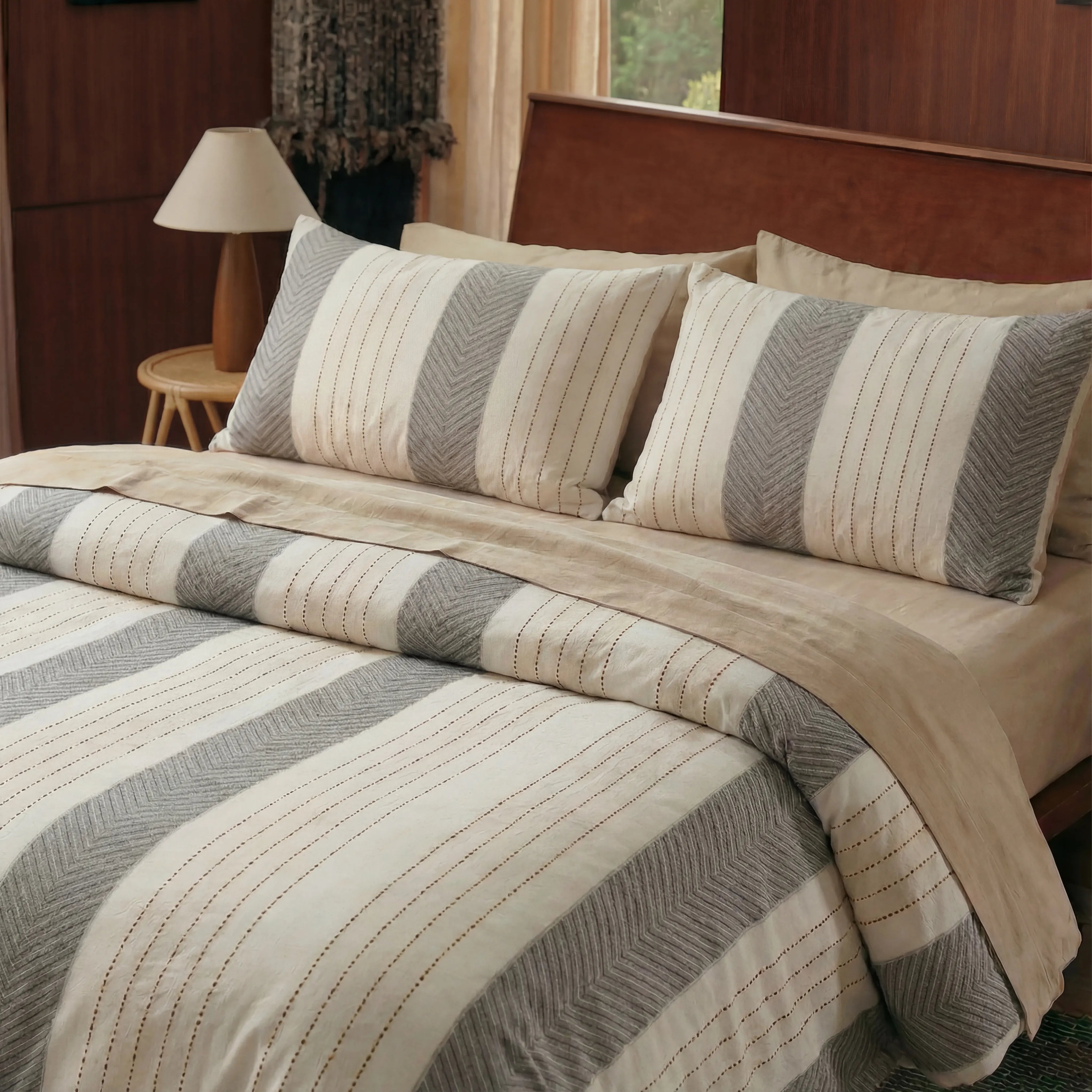neutral bedding set styled on bed