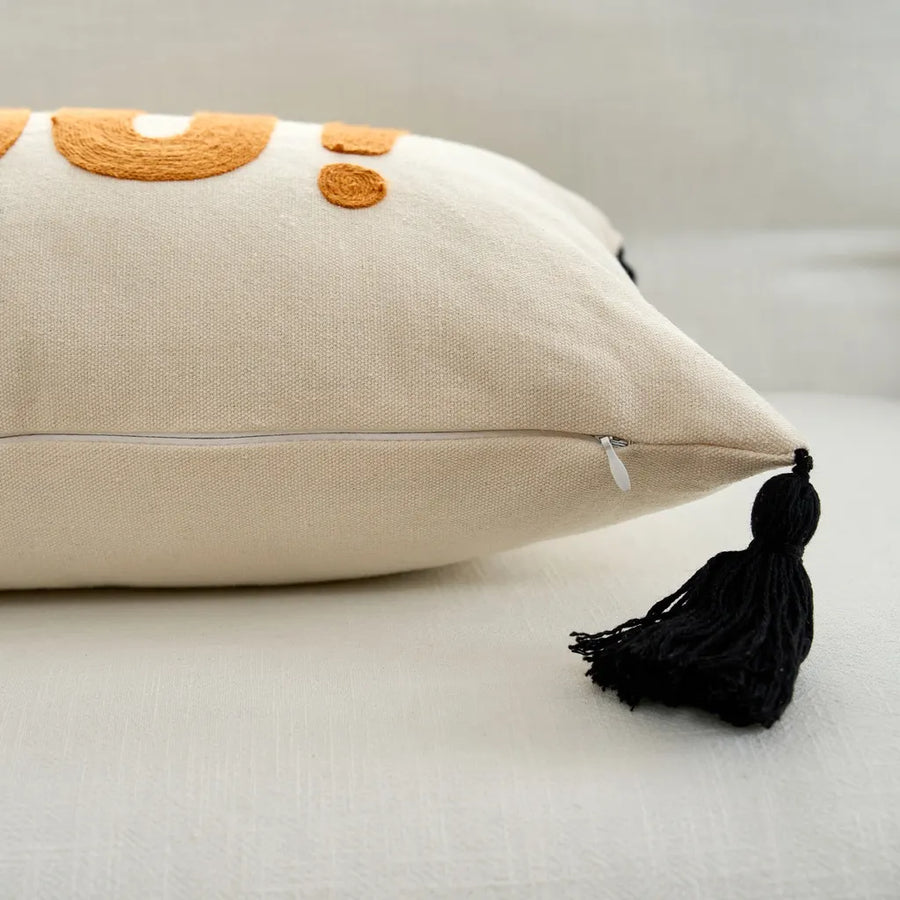 boo charm pillow cover ivory orange boo zipper black tassel detail