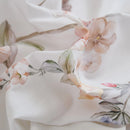close-up of detailed wildflower and butterfly print fabric texture cotton detail