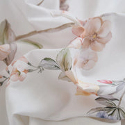 close-up of detailed wildflower and butterfly print fabric texture cotton detail