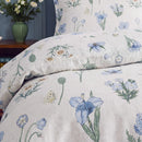 botanical whimsy floral duvet cover set blue iris daisy fabric close up