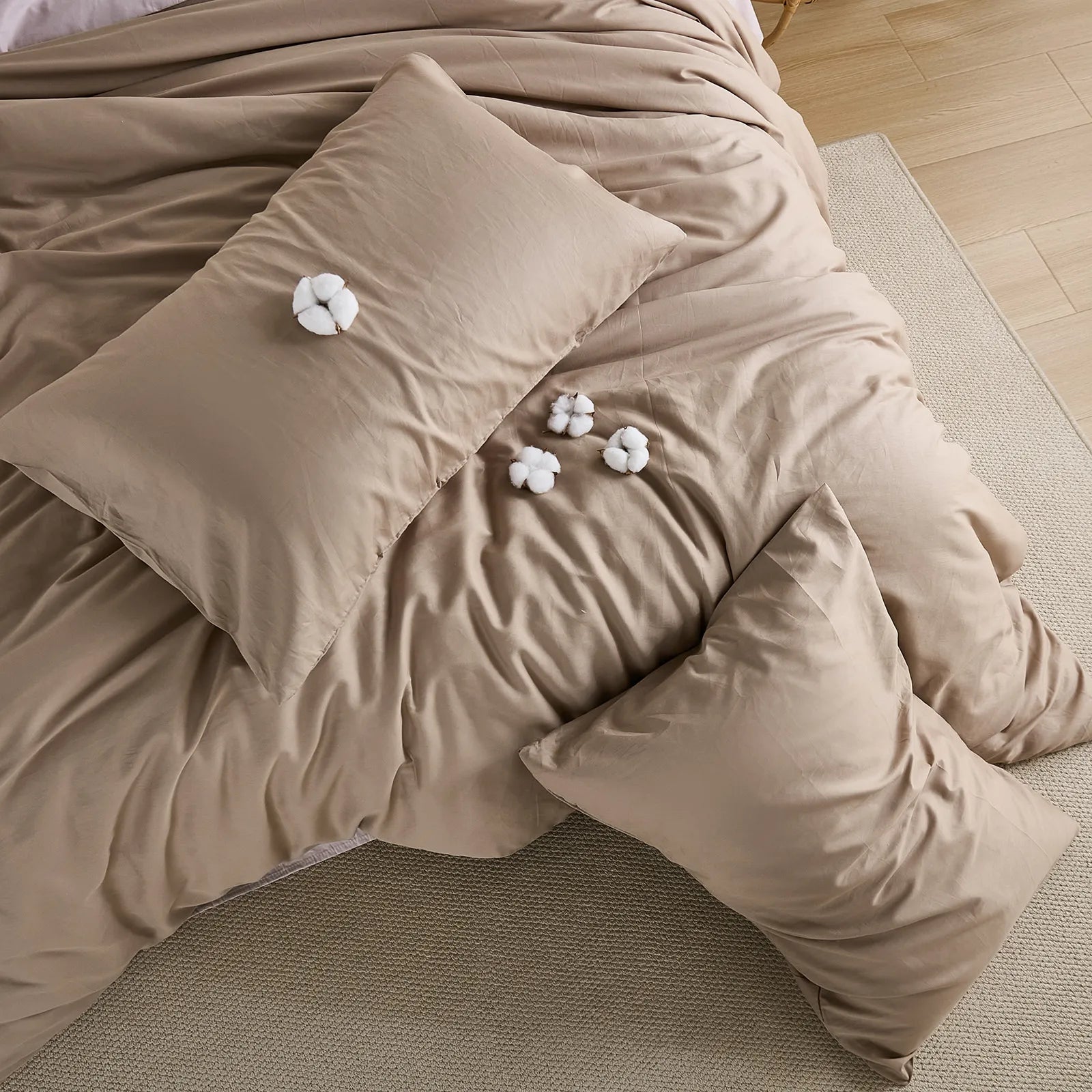 Top view layout of brown duvet with cotton accents