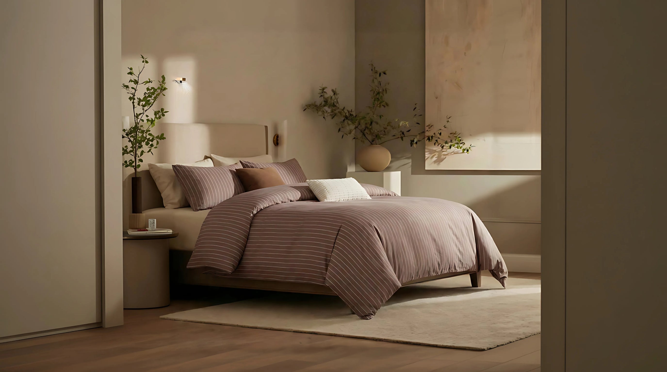 brown striped bedding in a minimalist bedroom