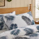 coastal navy charcoal palm pillowcases wooden bedframe styling