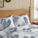 coastal navy charcoal palm shams layered bedding look