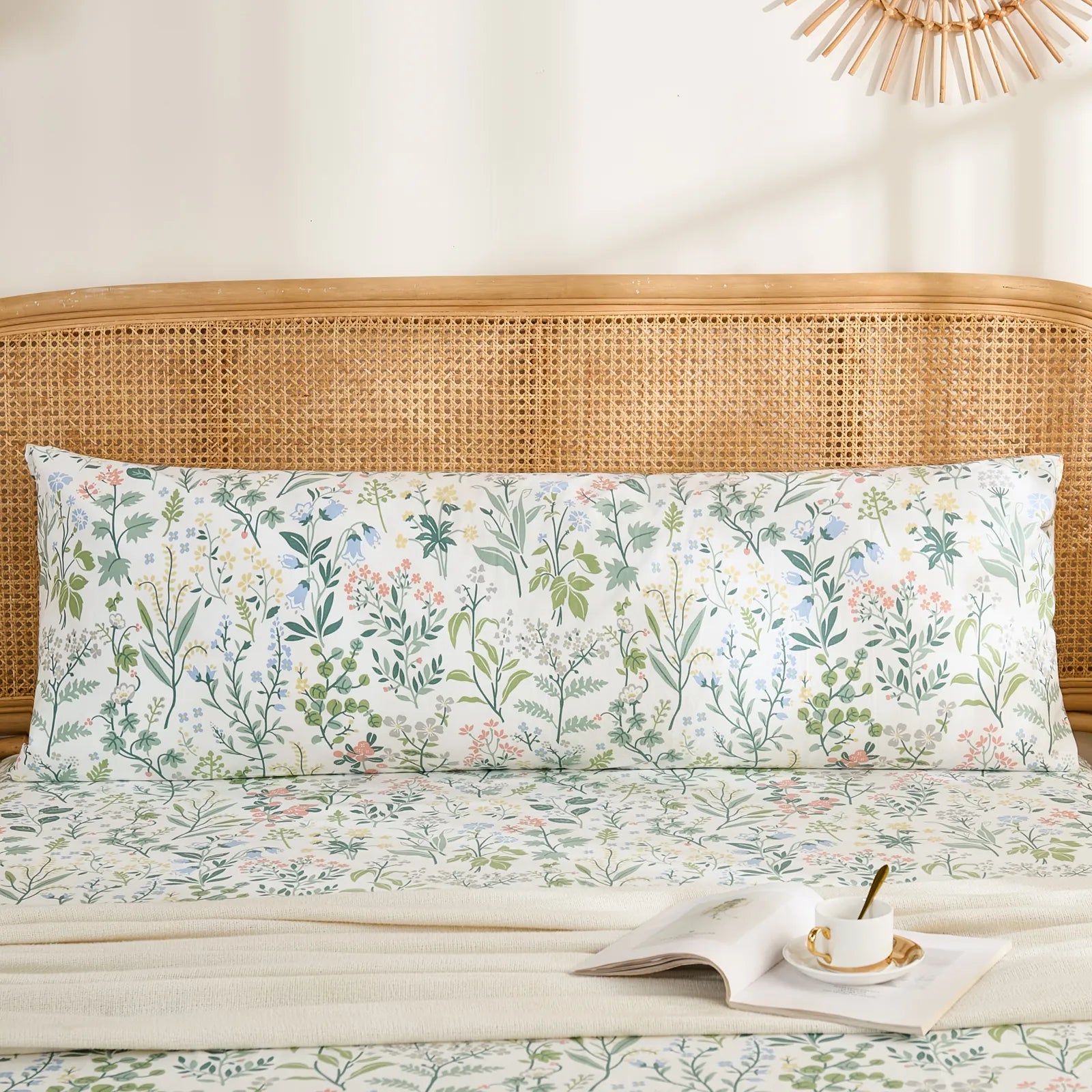 An angled close-up view of a cotton wildflower pillowcase, highlighting the fabric texture and the subtle floral print.