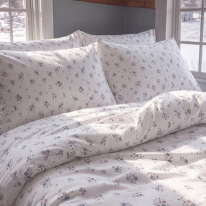 country breeze ditsy floral duvet cover set ivory blue rose sunlit bedding closeup bedroom