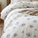 country breeze ditsy floral fabric texture close up detailed print