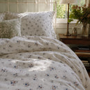 country breeze floral bedding warm sunlight lifestyle detail