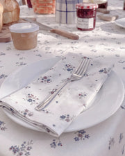country ditsy cloth napkin folded on plate