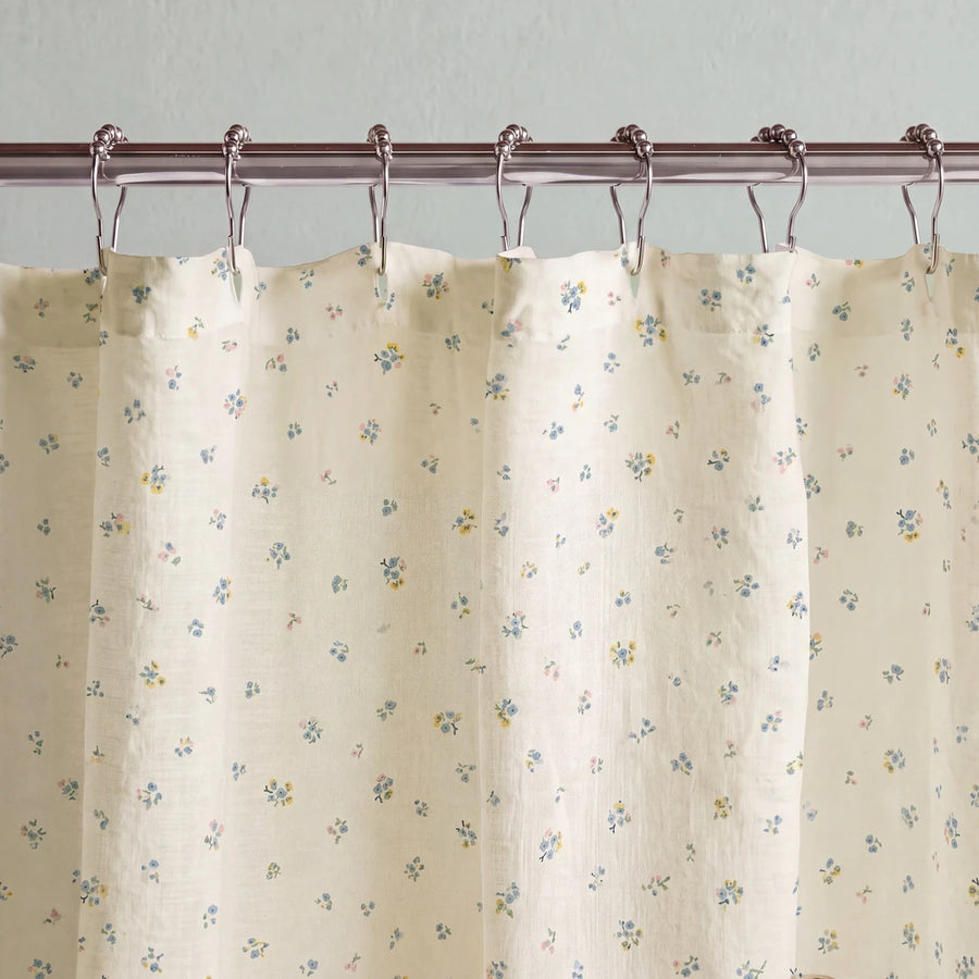 dainty wildflower meadow shower curtain cream blue metal rings light blue wall