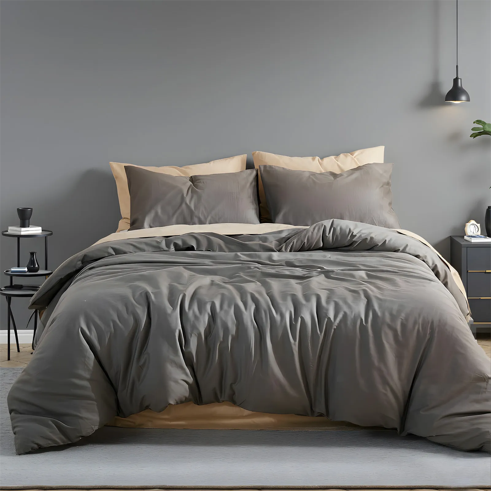 Dark gray solid duvet front view with two pillows on bed
