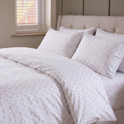 dreamy pastel comforter set pink blue floral pillowcases beige headboard