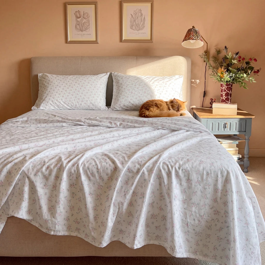 dreamy pastel sheet set sunlit bedroom with cat scene