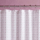 dreamy pastel shower curtain white metal rings mauve wall close up