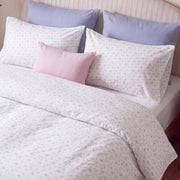 dreamy rose trellis duvet cover set lavender nightstand detail scene