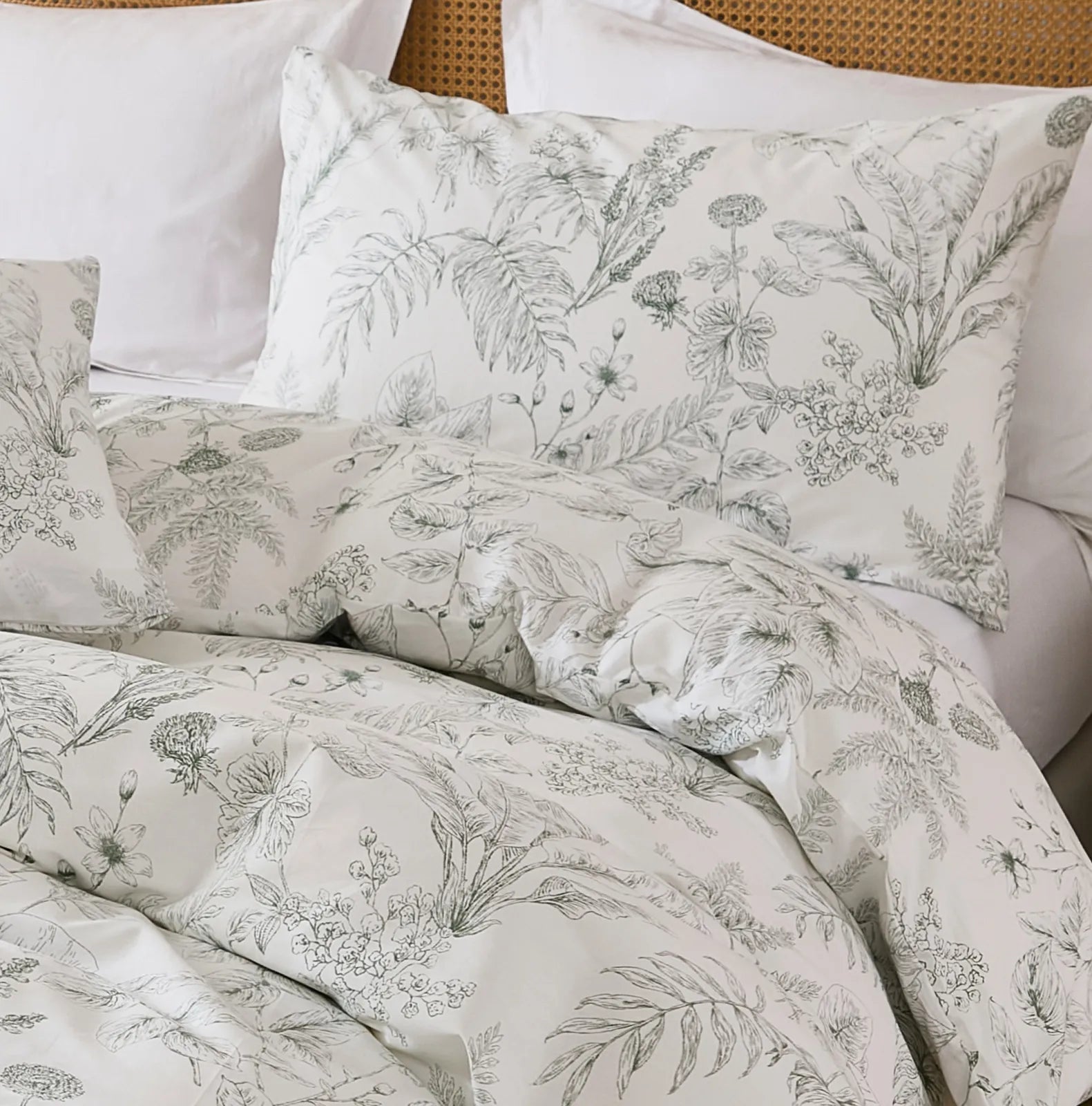 Close-up of the sketch-style floral pattern and texture on the duvet cover