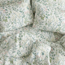 enchanted meadow wildflower bedding flat lay aesthetic