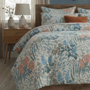 blue botanical leaf print cotton bedding set with a shabby chic farmhouse aesthetic
