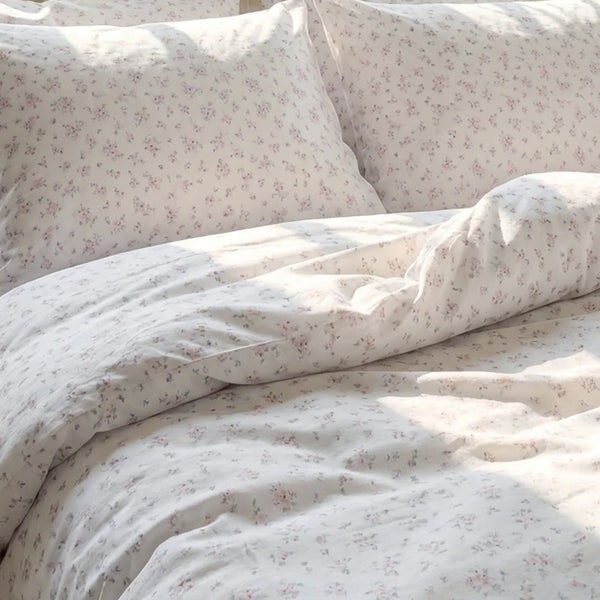 faded rose trellis duvet cover set sunlit fabric texture closeup