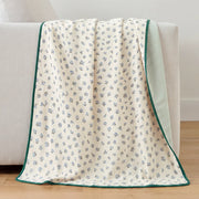 fernwood muslin blanket mauve medallion green grid back off white sofa