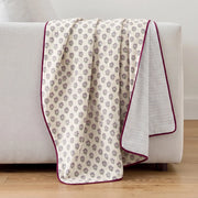 fernwood muslin blanket wildflower purple plum edge striped back light grey sofa