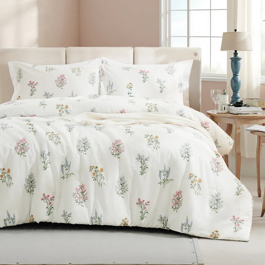Full view of the 100% cotton floral duvet cover set on a bed with pillows