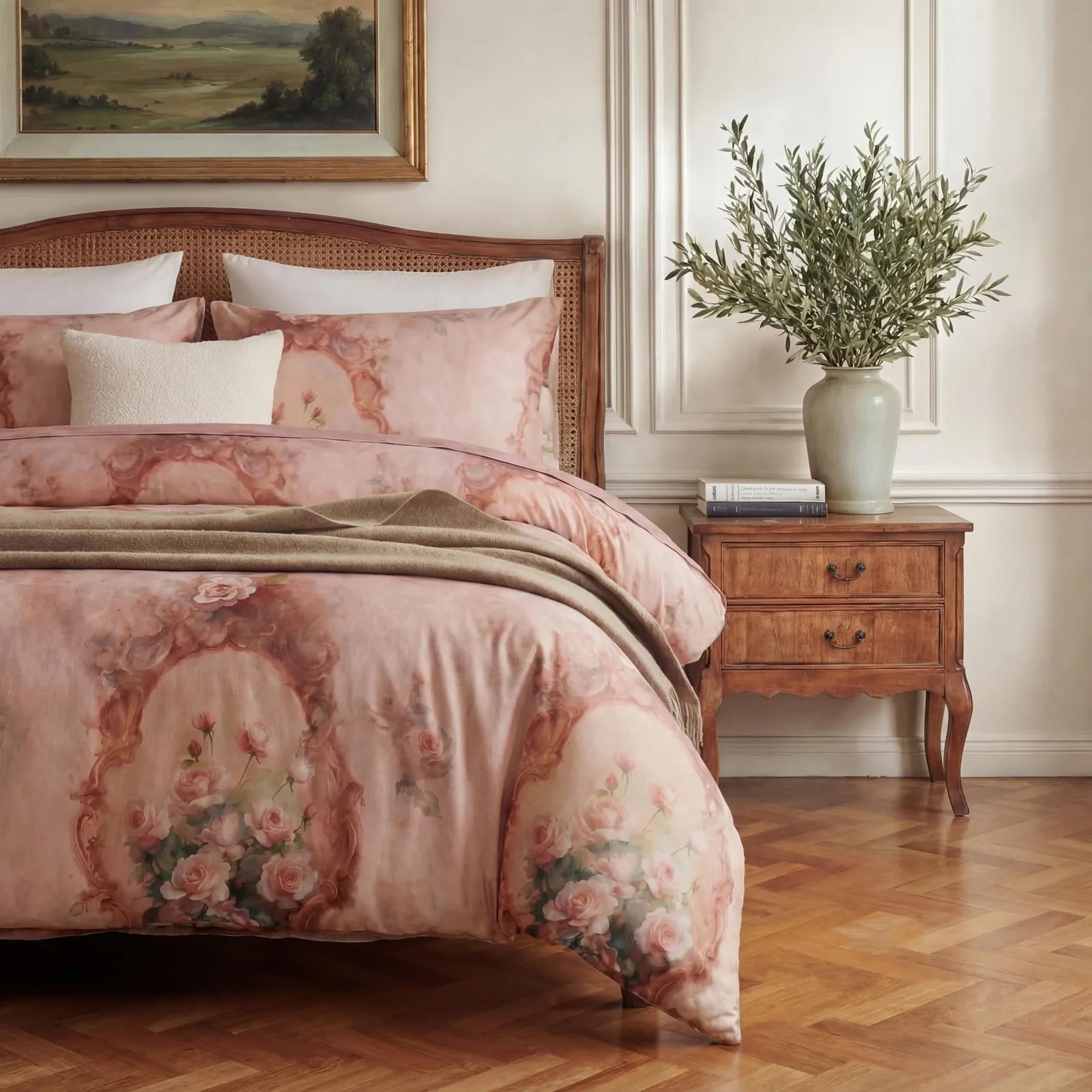 Pink floral duvet cover with brown throw blanket