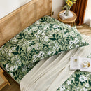 forest bloom botanical body pillowcase set on bed display