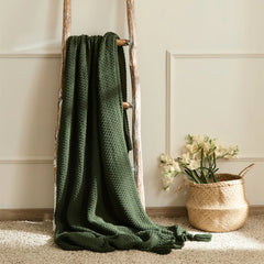 Forest Green Knitted Throw Blanket Draped on Wooden Ladder and Basket